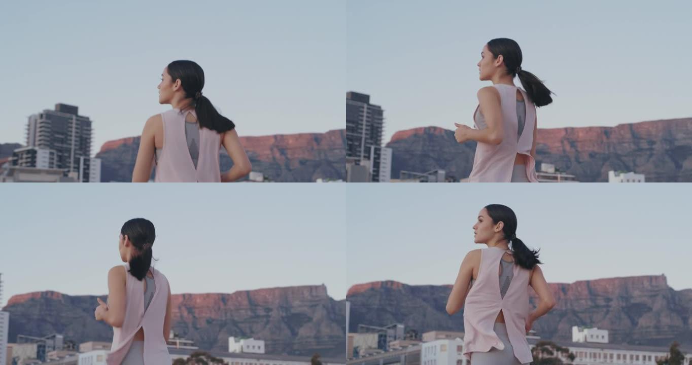 4k视频片段，一名年轻女子在城市跑步