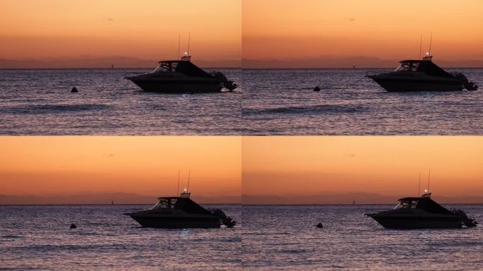 傍晚海边夕阳小船