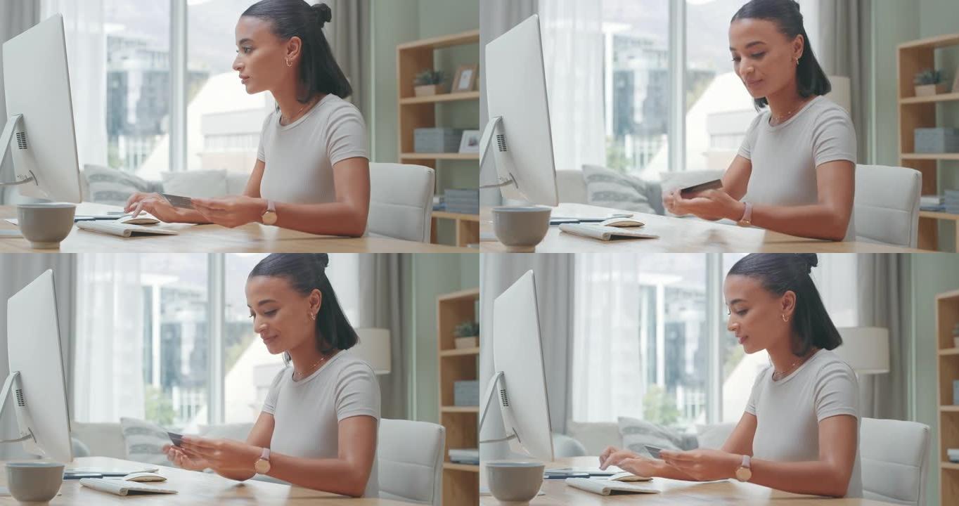 4k视频片段，一个迷人的年轻女子独自坐着并使用计算机进行在线购物