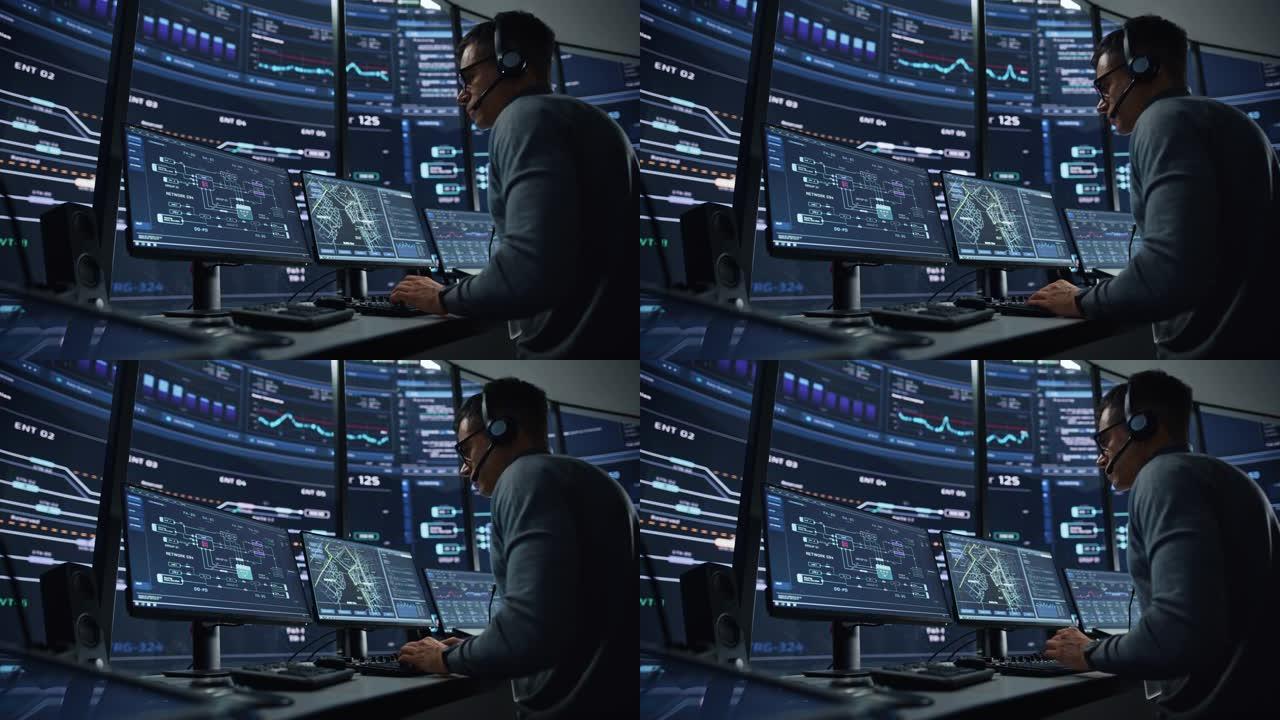 专业的it技术支持专家和软件开发人员在带有数字屏幕的监控控制室的计算机上工作。员工戴着带麦克风的耳机