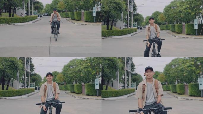 一个亚洲人的肖像骑自行车去上班。