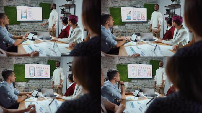 办公室会议室会议: 黑人首席应用程序设计师向多种族商人组成的多元化团队进行社交媒体送餐软件演示，解释