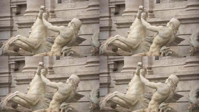 欧洲意大利拉齐奥地区罗马的特莱维喷泉上的特里顿和有翼的马。