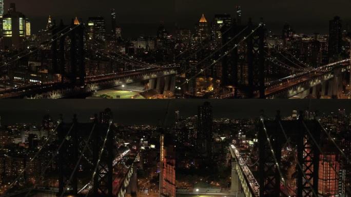 空中: 半夜曼哈顿大桥的壮观无人机景观。