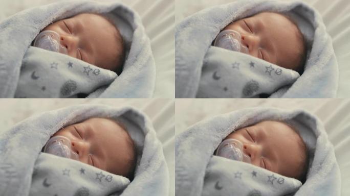 4k录像，一个新生婴儿用奶嘴睡觉