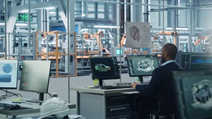 汽车工厂办公室: 在台式计算机上工作的黑人工程师，屏幕显示带有3D涡轮发动机的cad软件，电动汽车。