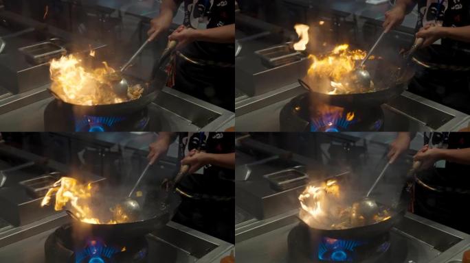 4K UHD慢动作: 用火焰烹饪Padthai面条，泰国美食。