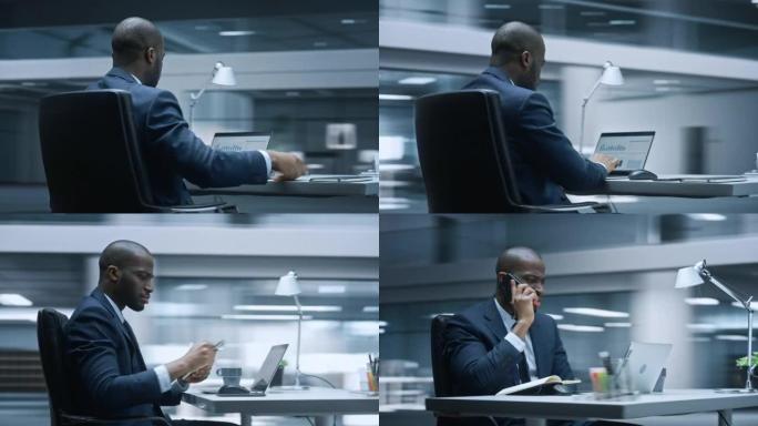 360度延时办公室: 富有成效的黑人商人坐在办公桌前在电脑上工作。穿着西装与投资合作的非裔美国企业家
