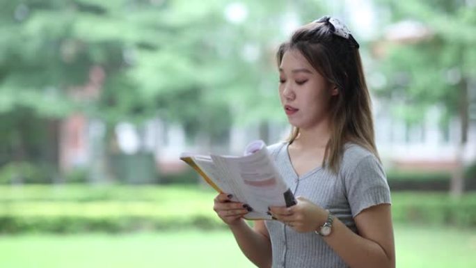 亚洲大学生在校园读书