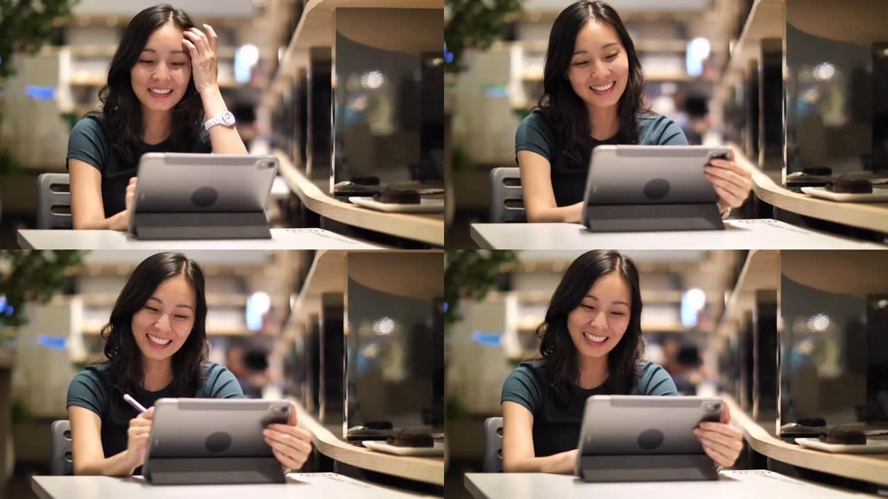 使用数字平板电脑的亚洲女性