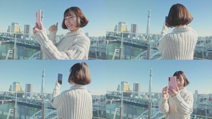 日本东京通过智能手机直播女性旅行博客