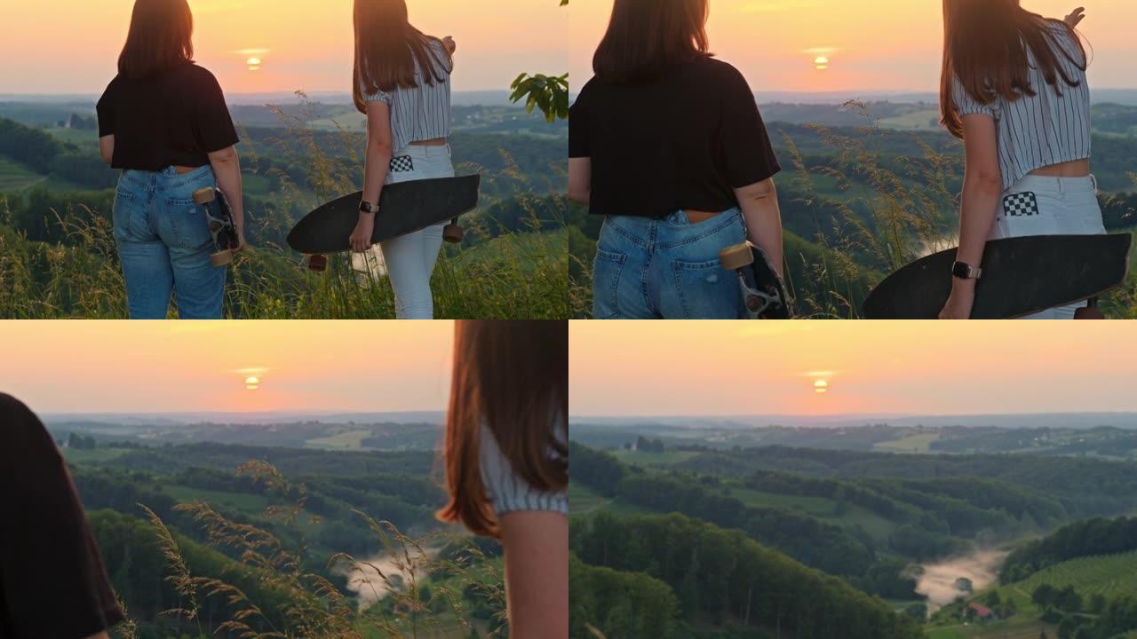 十几岁的女孩看着乡村风景的后视图