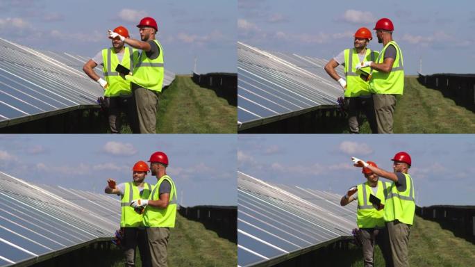 男同事讨论太阳能电池板