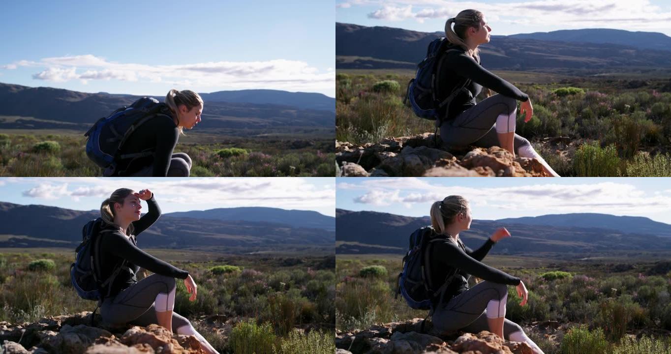 4k视频片段，一名年轻女子在远足中休息