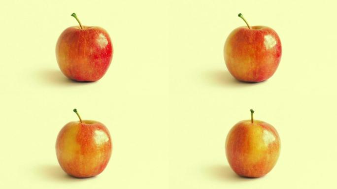红苹果在普通背景上旋转