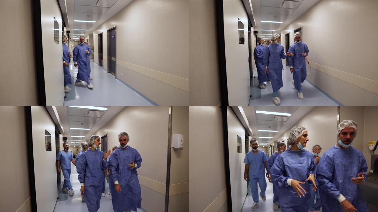 外科医生和实习生的多样化群体在手术后离开手术室