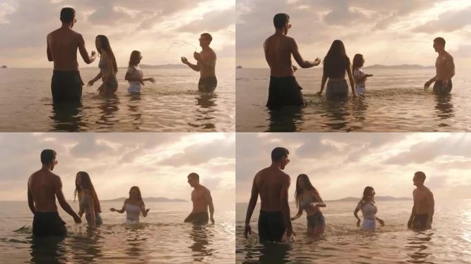 两对夫妇在日落时在海洋上玩耍