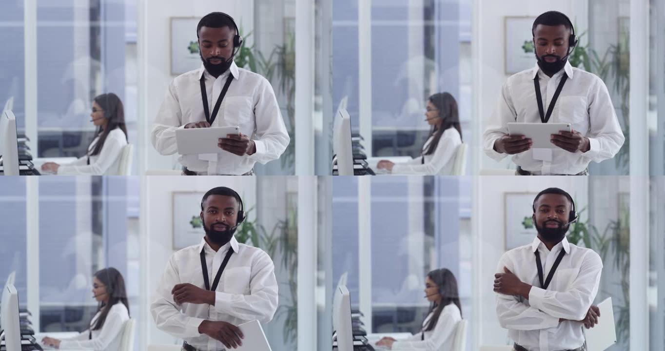 4k视频片段，一名年轻商人站在办公室并戴着耳机使用数字平板电脑