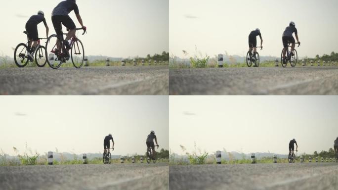 日落前中午通过骑自行车锻炼两名运动男子