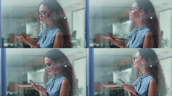 一名年轻女商人使用智能手机发送短信的4k视频片段