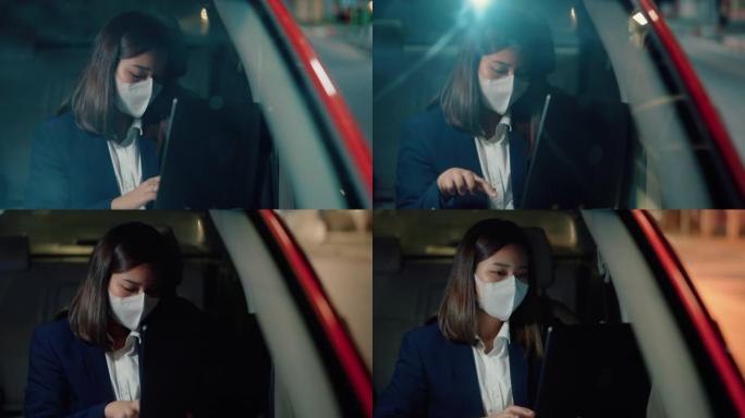 女人晚上通勤时戴医用口罩。