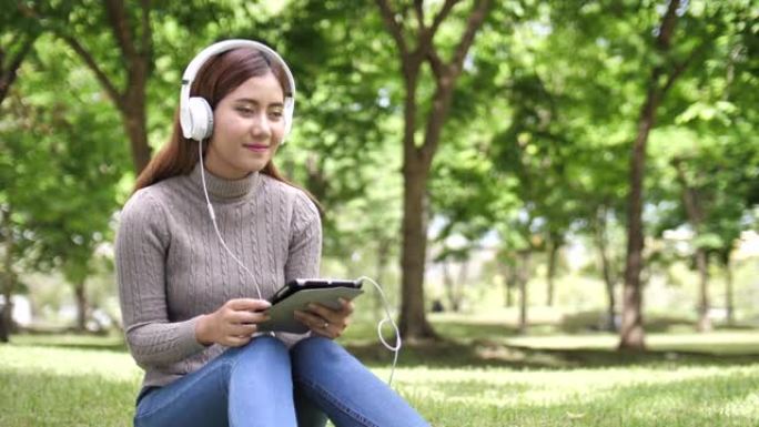 听音乐的亚洲女性放松心情享受音乐