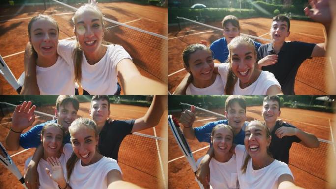 在阳光明媚的日子里，在球场上进行友谊赛或训练锻炼游戏后，年轻快乐的青少年网球运动员的朋友们玩得很开心
