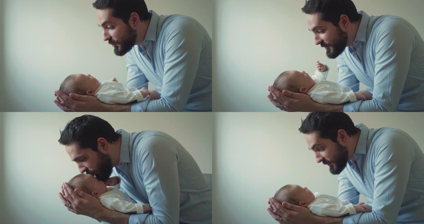 年轻的neo父亲的电影镜头在早晨与他的新生婴儿在托儿所里玩耍。孩子，婴儿，父母身份，童年，生活，爱情