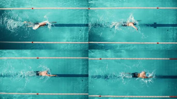 空中俯视图: 肌肉发达的男性游泳运动员在游泳池潜水。职业运动员优雅地跳跃，游泳自由泳，训练决心赢得冠