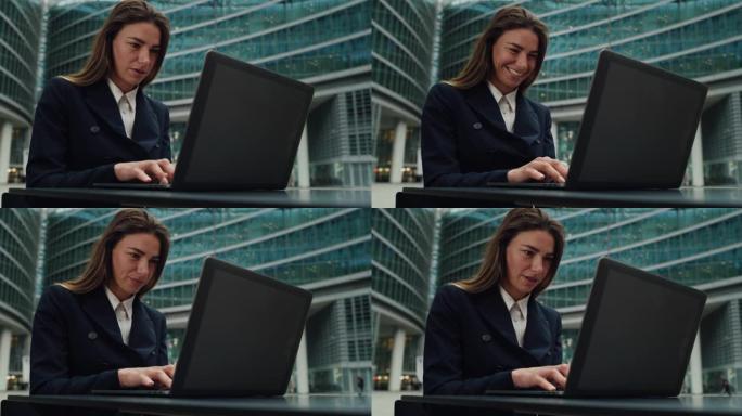 商业女性在办公室摩天大楼背景上控制和发送工作电子邮件的电影拍摄。技术、网络、连接、企业、金融、成功的