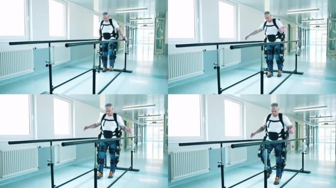 一名残疾男子正试图穿着外骨骼走路