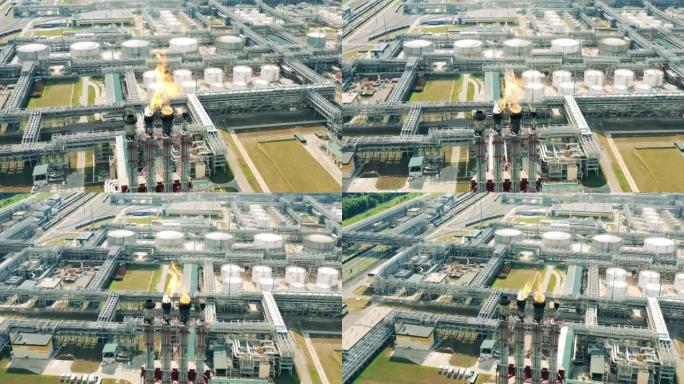 炼油厂火炬堆和金属管的俯视图