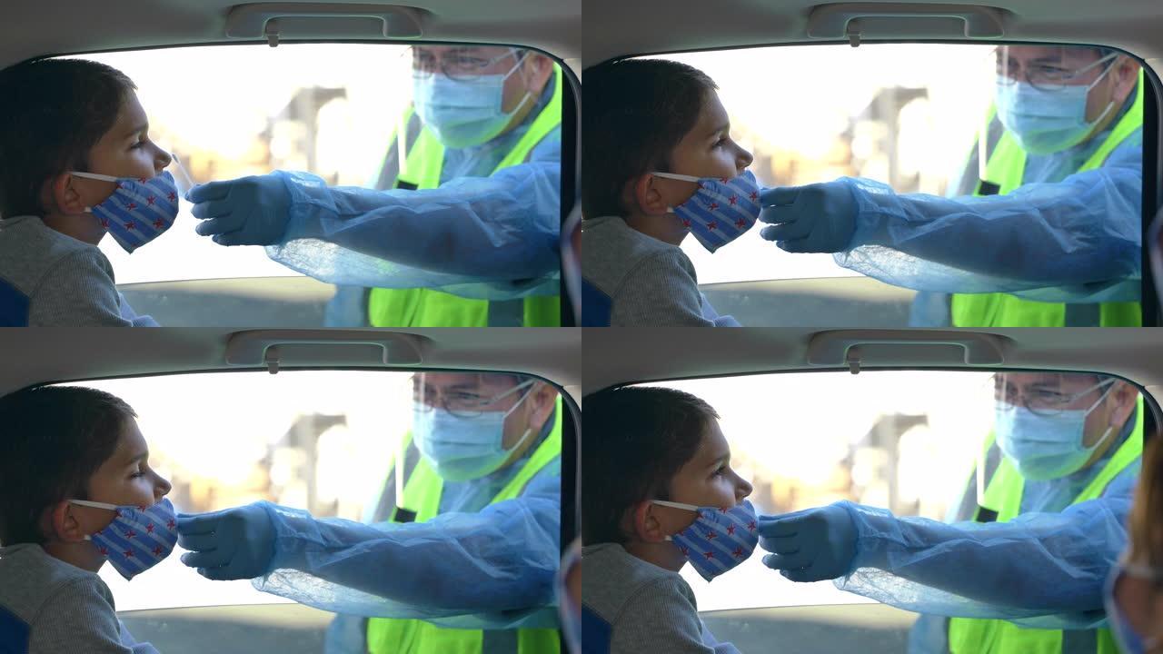 医疗专业人员服用鼻拭子测试新型冠状病毒肺炎。