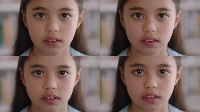 肖像快乐的小女孩与自然的童年天真看起来快乐的孩子与严肃的表情4k镜头