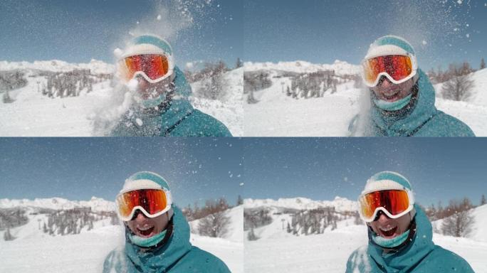 肖像: 快乐的女性滑雪者被浮肿的雪球击中脸。