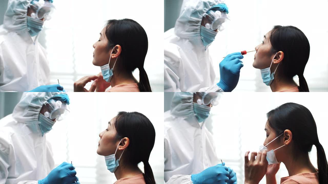 男性实验室用拭子采集鼻腔培养样本，以便进行生化分析。这是新型冠状病毒肺炎的采样方式