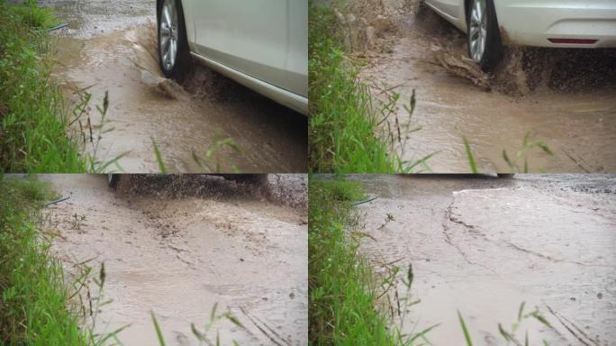 汽车穿越泥泞的水坑