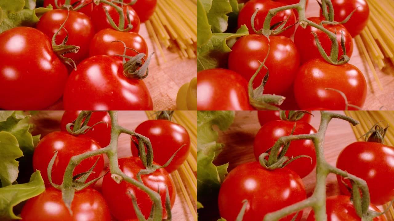 慢动作，特写: 成熟的红色新鲜美味西红柿的运动视图