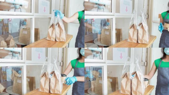 亚洲女服务员戴口罩准备食物和咖啡外卖，新的小企业和新的正常概念