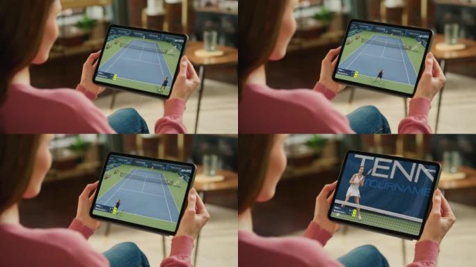 肩膀上的女人使用数字平板电脑观看女子网球锦标赛体育电视转播。参加比赛的专业运动员。网络直播频道电视流
