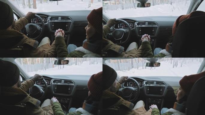 夫妇在冬天开车旅行