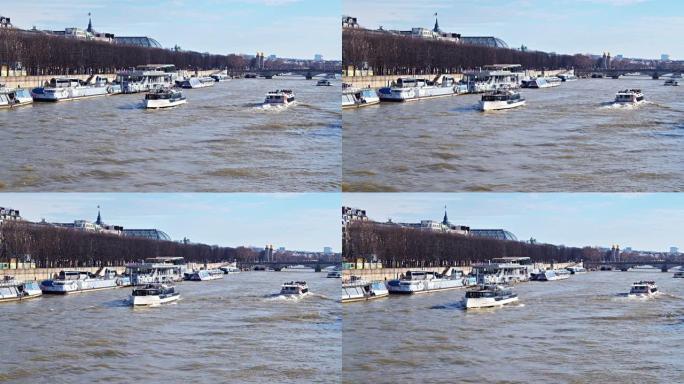 巴黎河流中的船只和渡轮。滨水区。旅游。游。树。自然。
