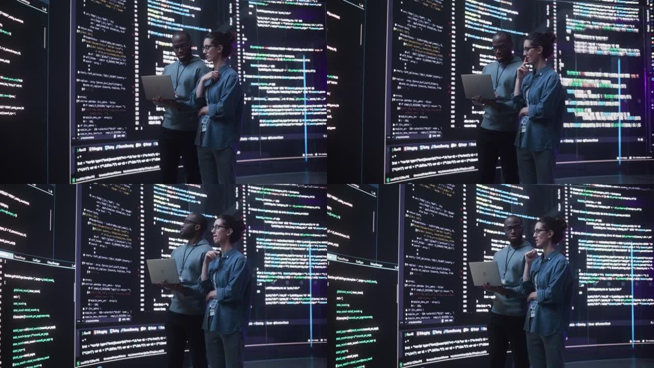 使用笔记本电脑描绘了两个不同的开发人员，讨论了围绕它们的大屏幕上出现的代码行。男女程序员一起创建软件