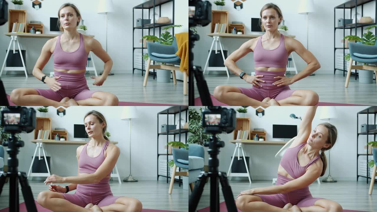 瑜伽教练视频记录器使用演示体式和口语的相机为在线视频日志制作视频