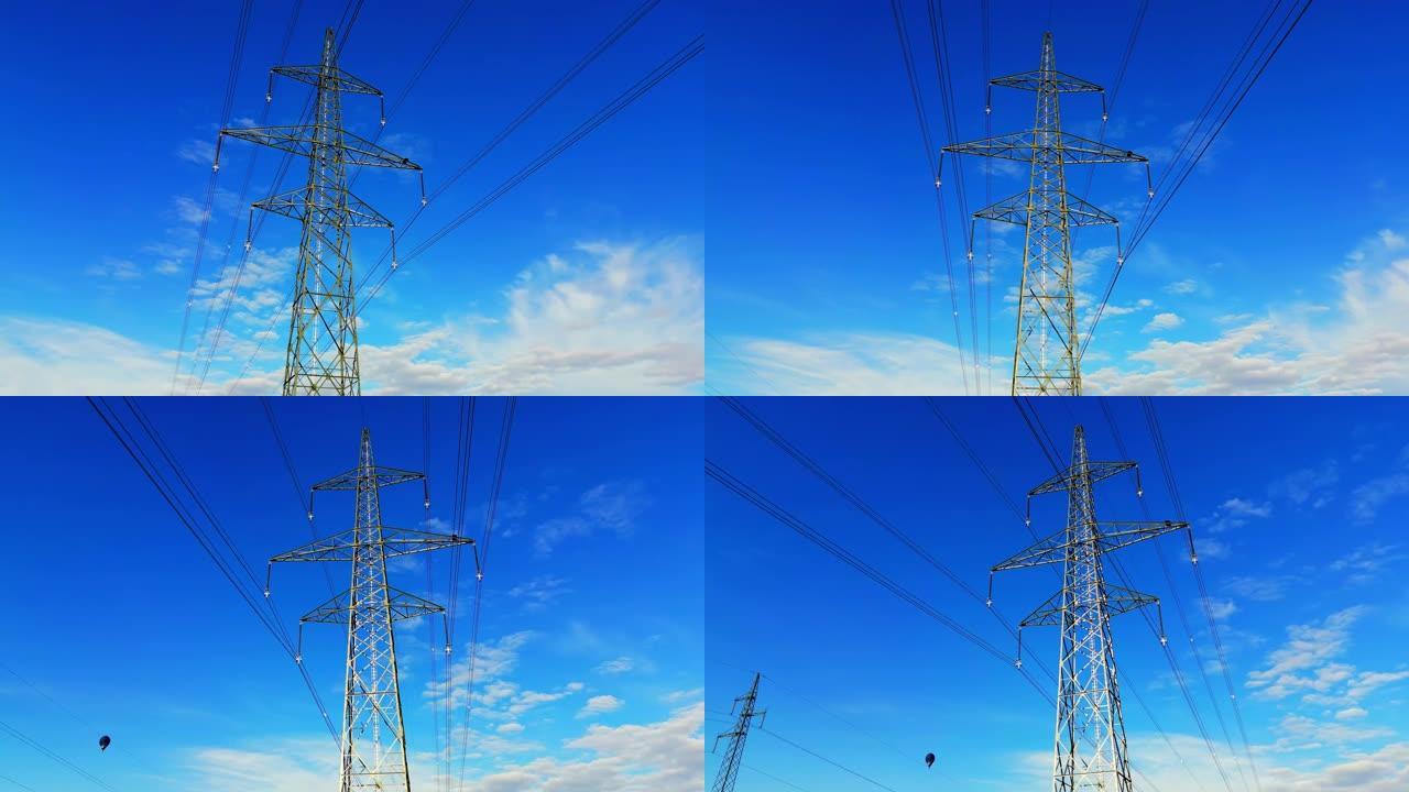 晴朗蓝天下的电力塔和电线