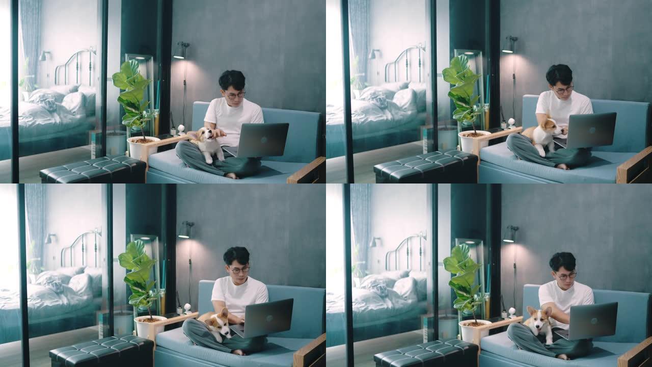 忙碌的人在家工作，他的狗在客厅。