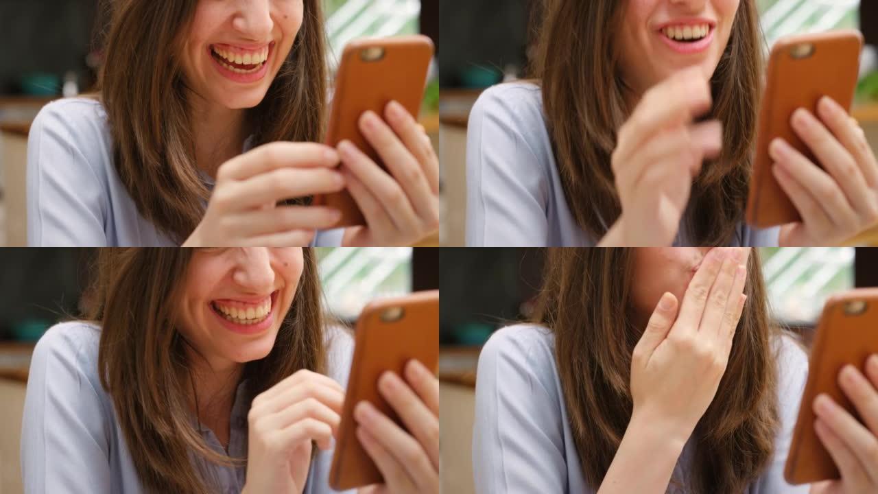 4k视频片段，一名年轻女子在视频通话中吹吻