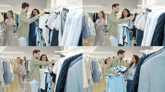 男人和女人在现代商店里聊天和打架买衣服