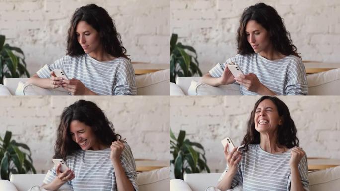 一名兴高采烈的西班牙裔女子手持手机庆祝网上投注胜利