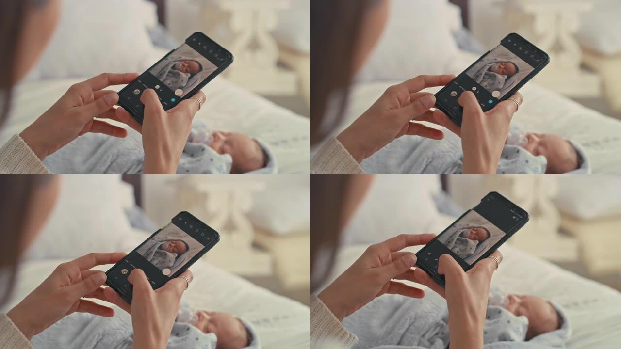 一名妇女为新生婴儿拍照的4k视频片段
